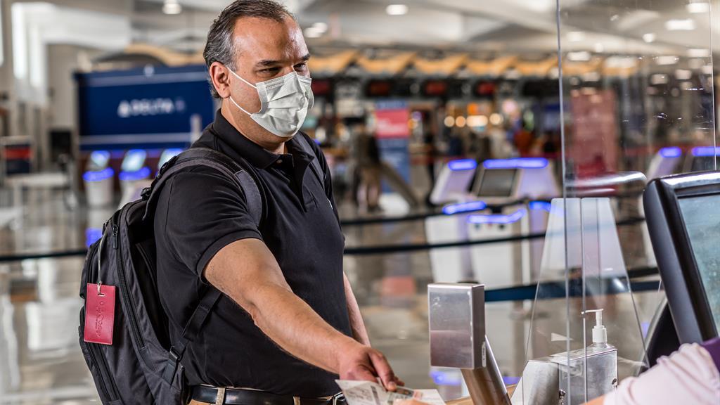 Delta Air Lines passenger with mask