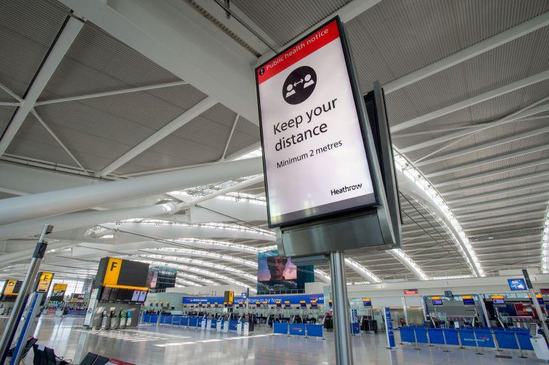 Heathrow Airport keep distance sign 