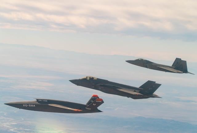 XQ-58 flies in formation with an F-35A and F-22 
