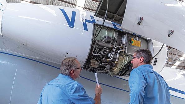 mechanics working on aircraft