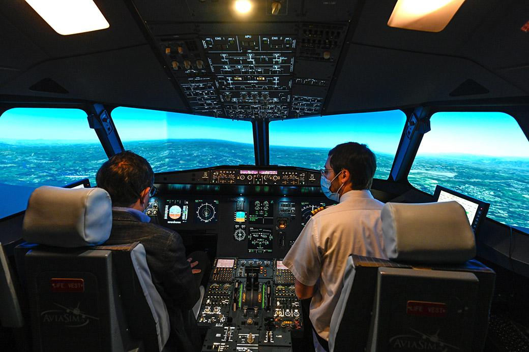 French pilots in Airbus aircraft simulator