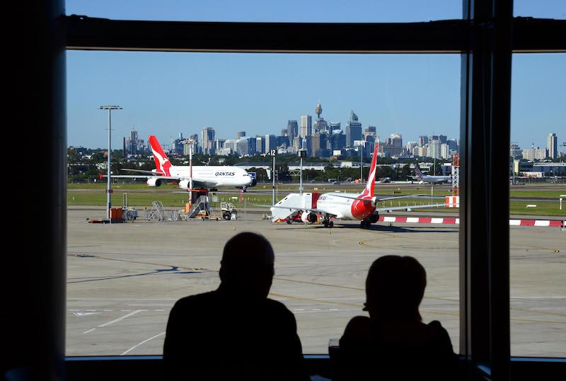 Sydney Airport with city skyline