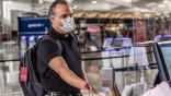 Delta Air Lines passenger with mask