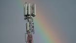 5G tower and rainbow