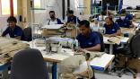 workers at Soisa Aircraft Interiors factory sewing